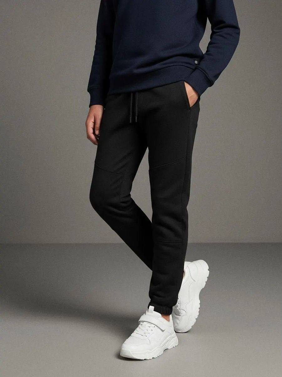 Pantaloni de trening tip jogger