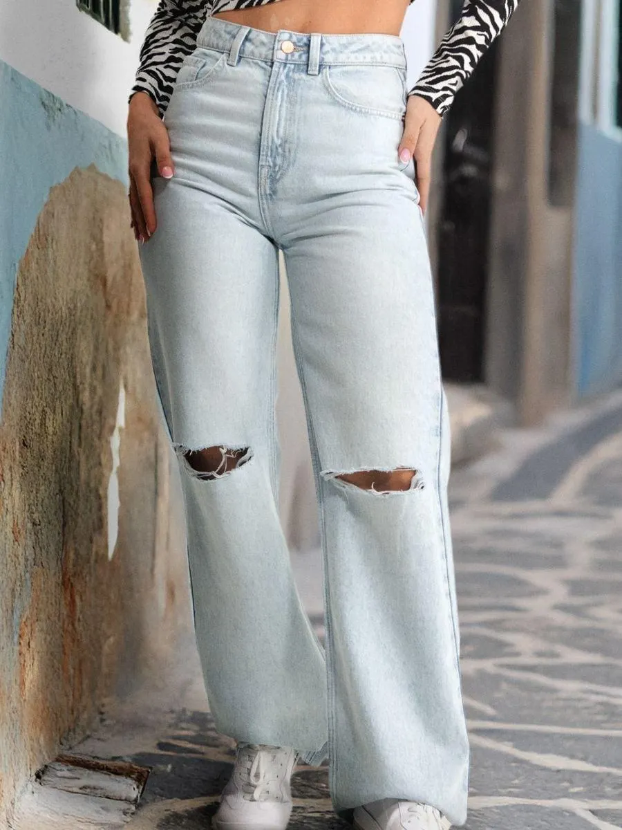 Blugi cu crac larg și talie înaltă