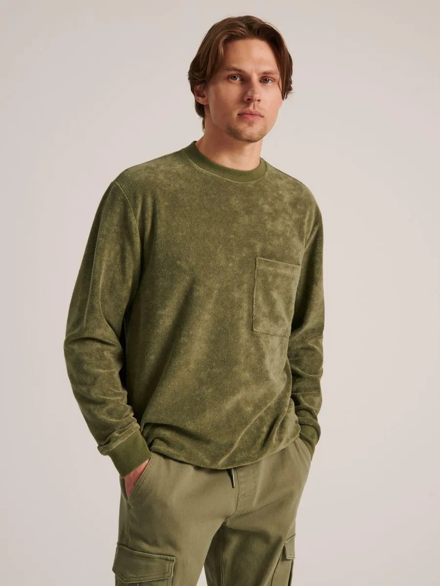 Bluză sport cu margini ripsate