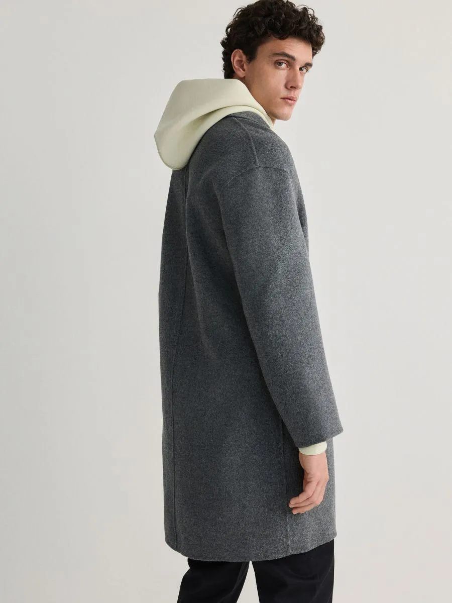 Haină cu conținut ridicat de lână