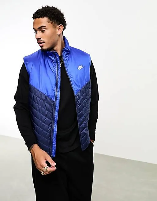 Nike – Windrunner – Marinblå, halvgrov väst med vaddering