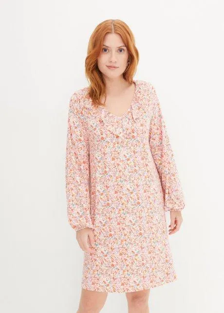 Klänning med volang längs halsringningen