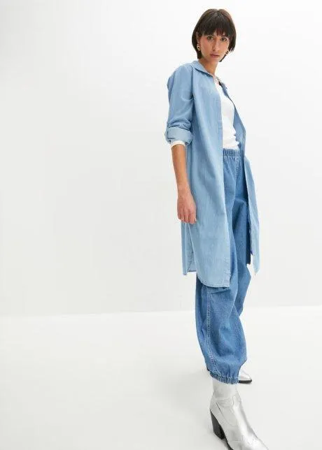 Lång blus med sprund i sidorna