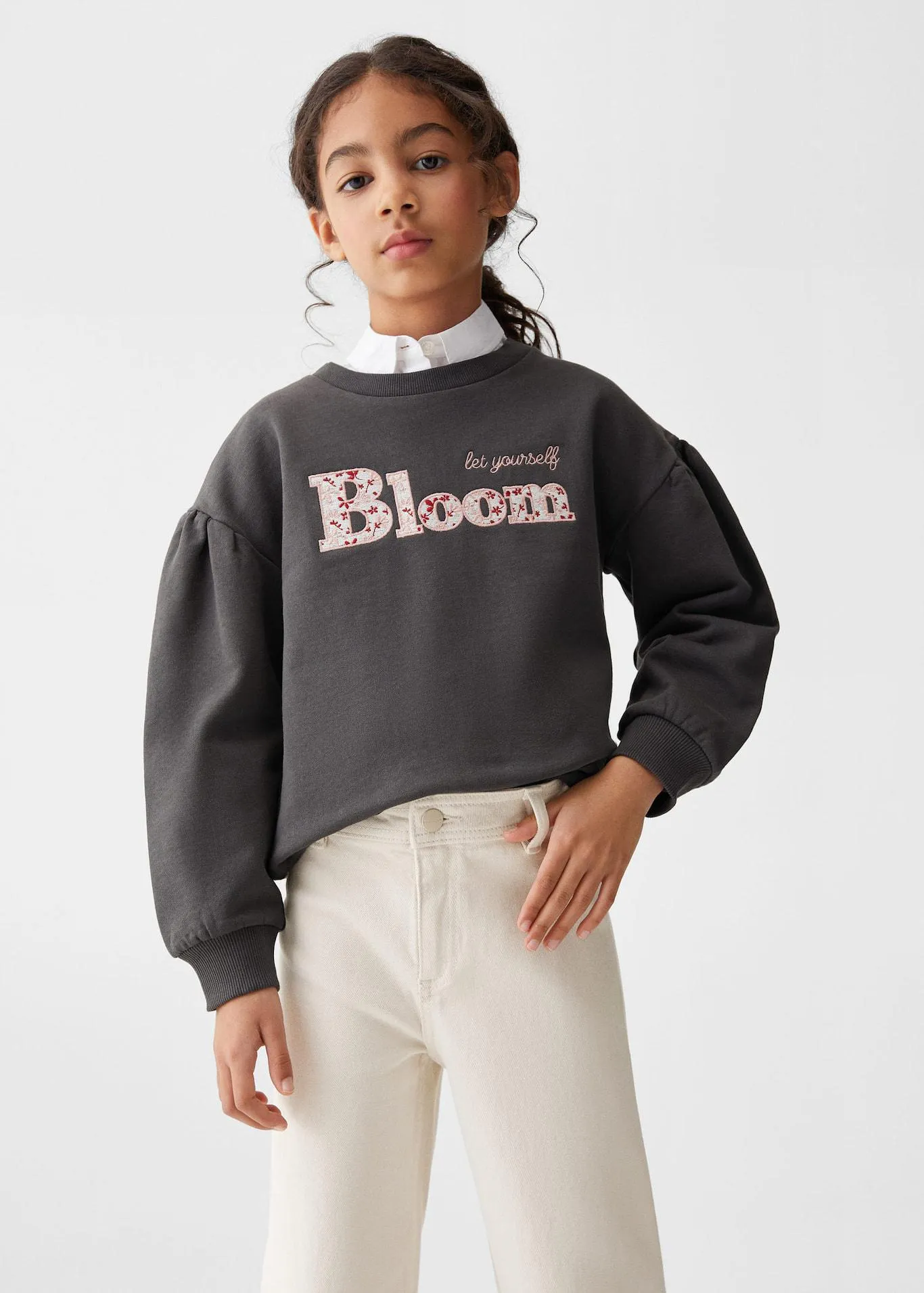 Sweatshirt met geborduurde boodschap