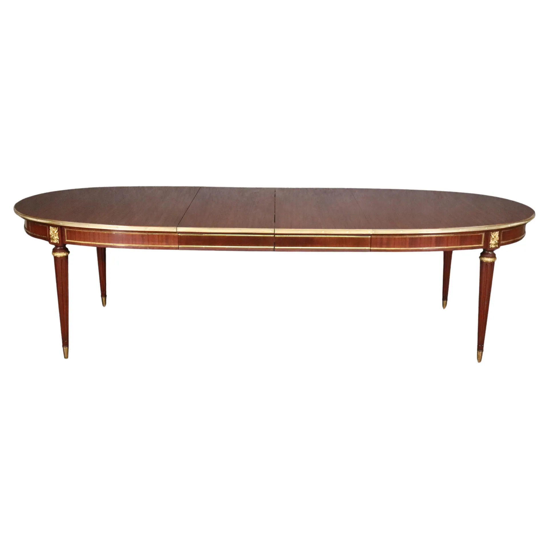 Maison Jansen Mesa de comedor de caoba estilo Luis XVI con dos hojas