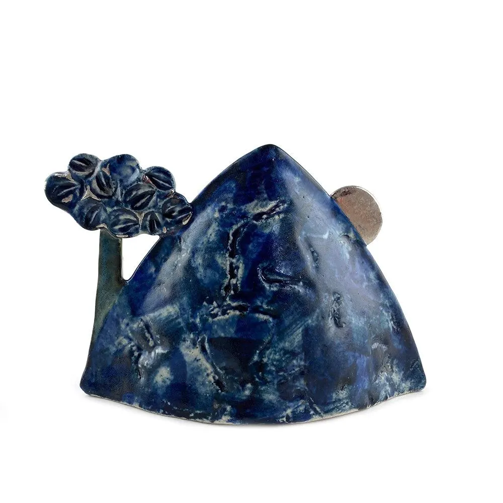 At the Foot of the Hill