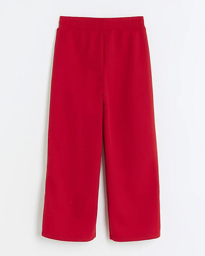 Girls red side popper joggers