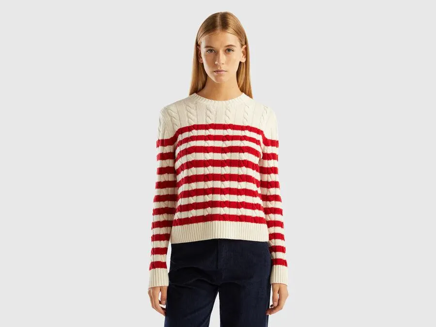 Striped sweater with cables