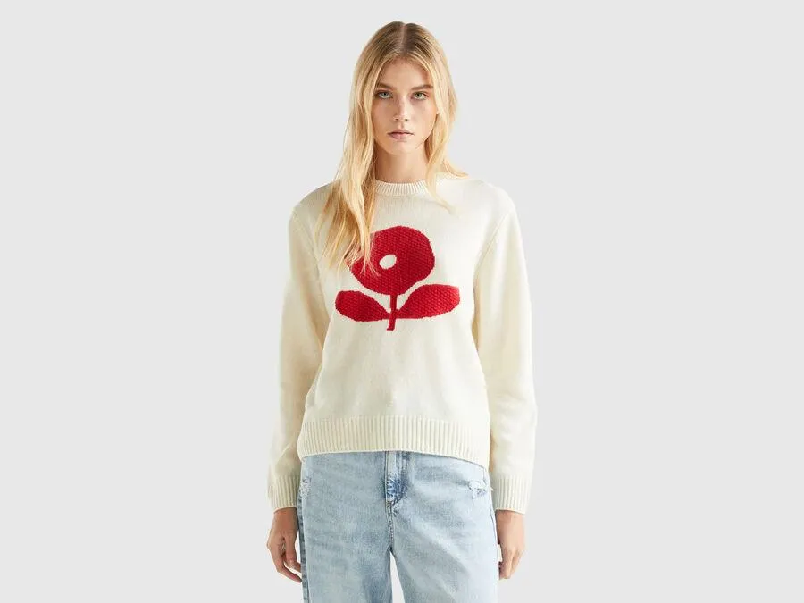 Sweater with floral inlay