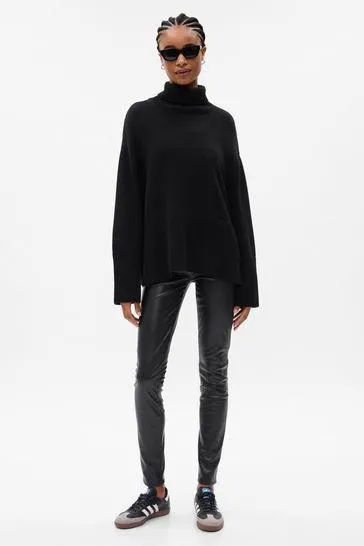 Split Hem Turtle Neck Jumper