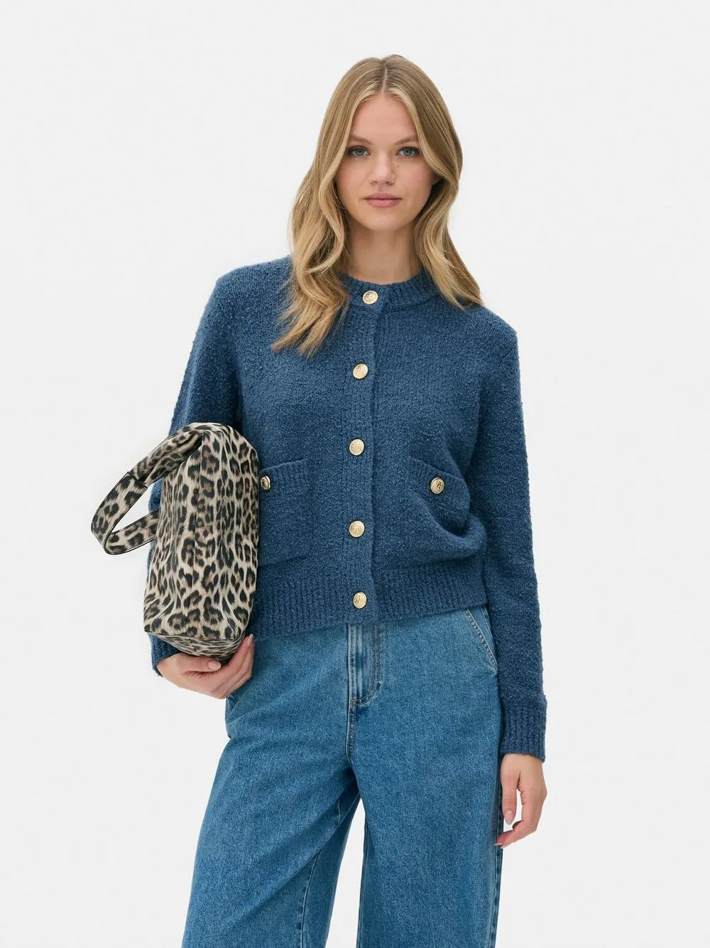 Cardigan in bouclé con bottoni