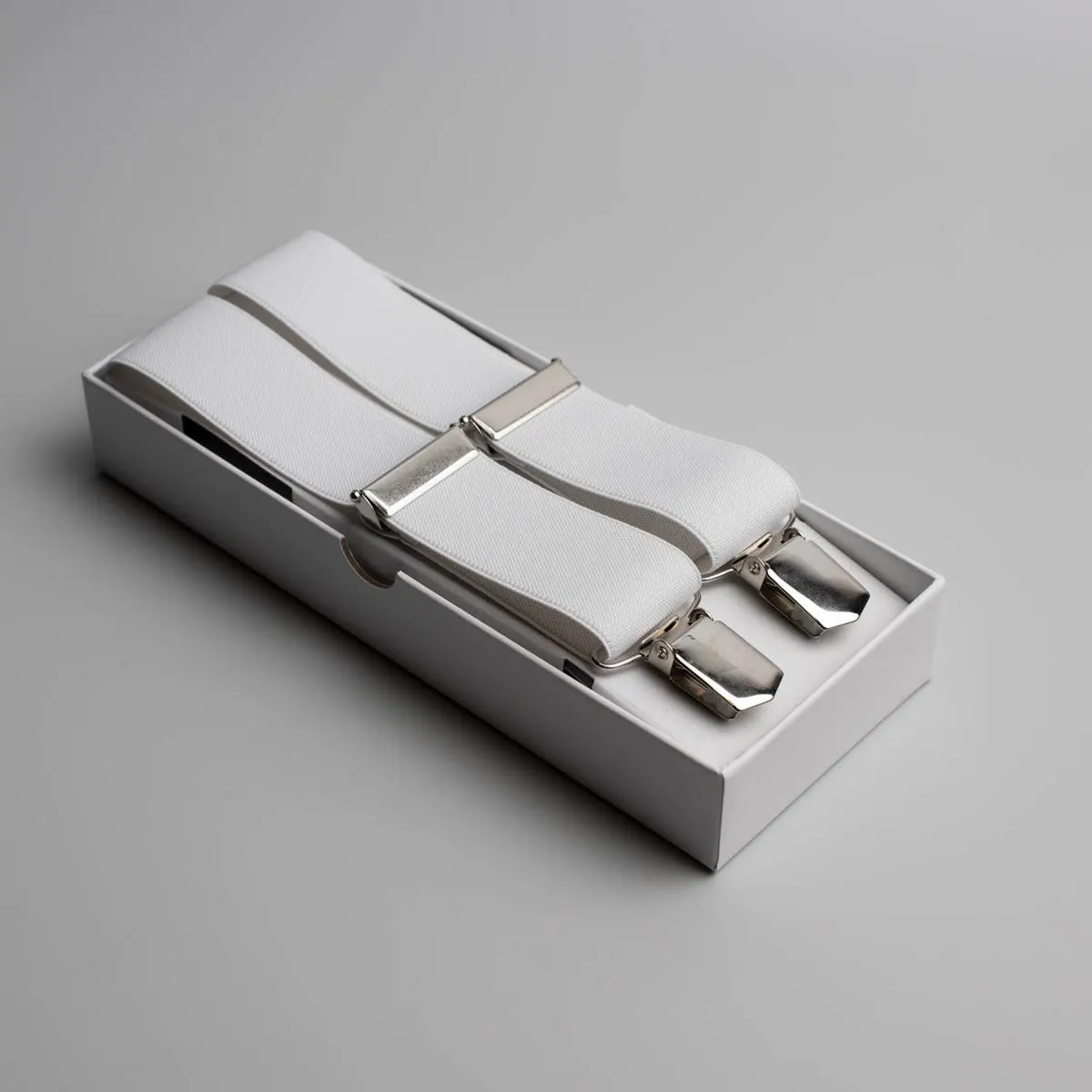 Dotted suspenders in white