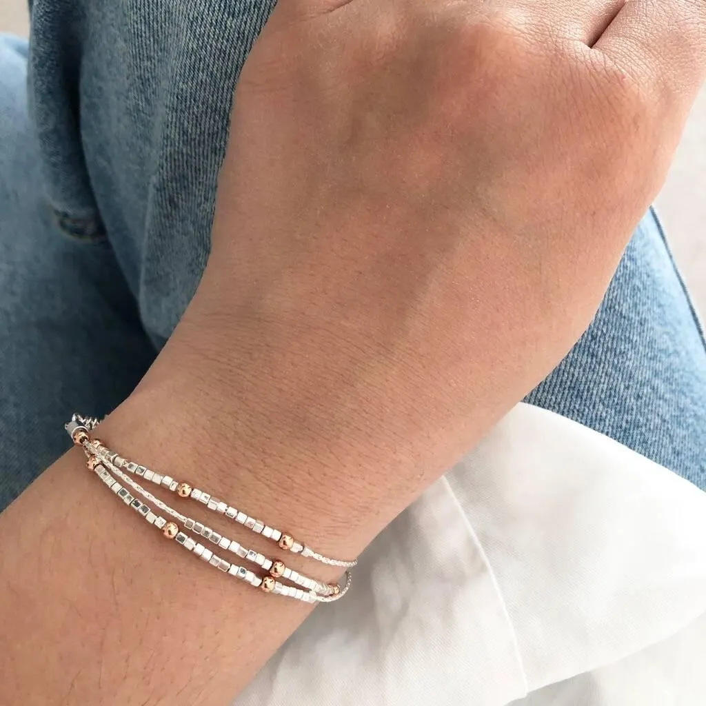 Layered Beaded Bracelet In Silver And Rose Gold Plating