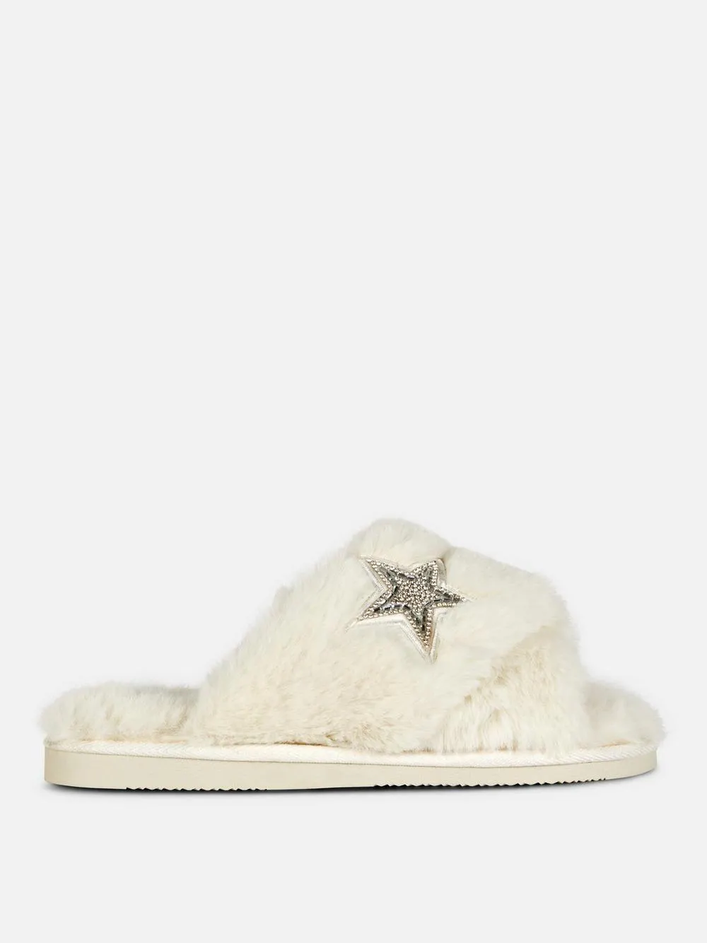 Hausschuhe mit überkreuzten, verzierten Riemen