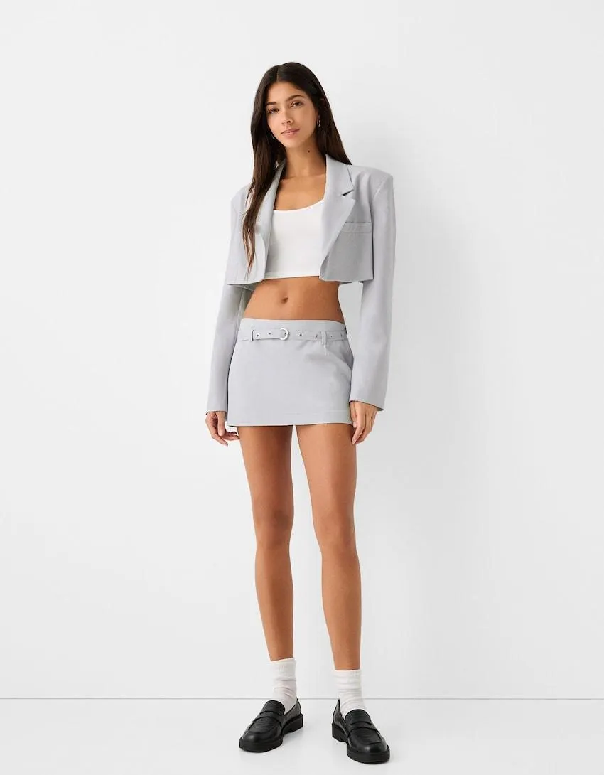 Mini skirt with buckled belt