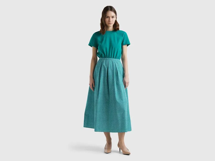 Long dress with printed skirt