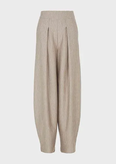 Wide trousers in pinstriped cashmere jersey and silk