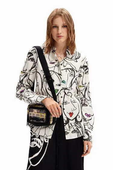 Small canvas newspaper crossbody bag