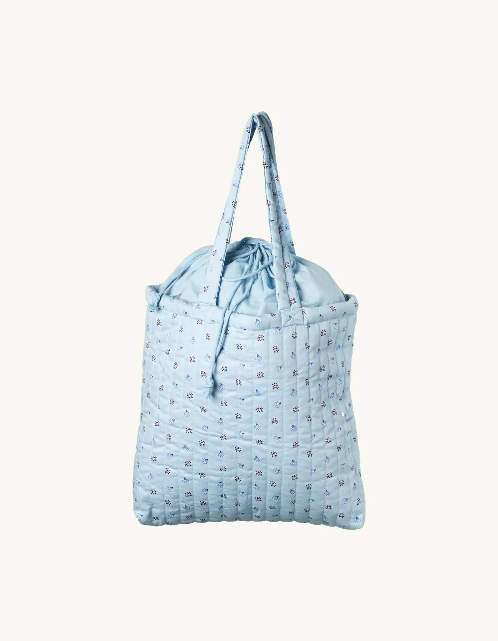 Organic cotton/polyester. 22 x 16 x 13.5 cm.