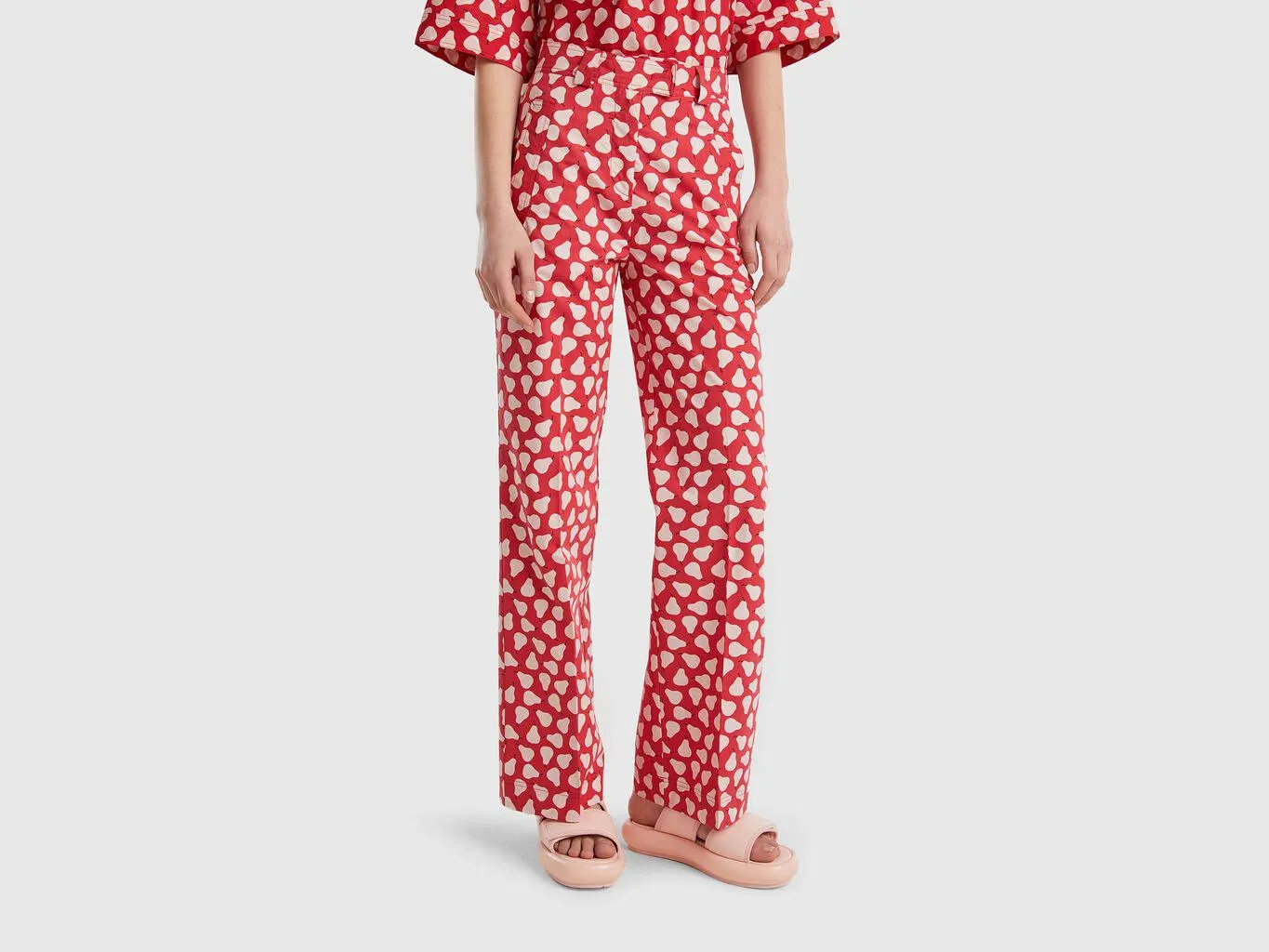Red palazzo trousers with pear pattern