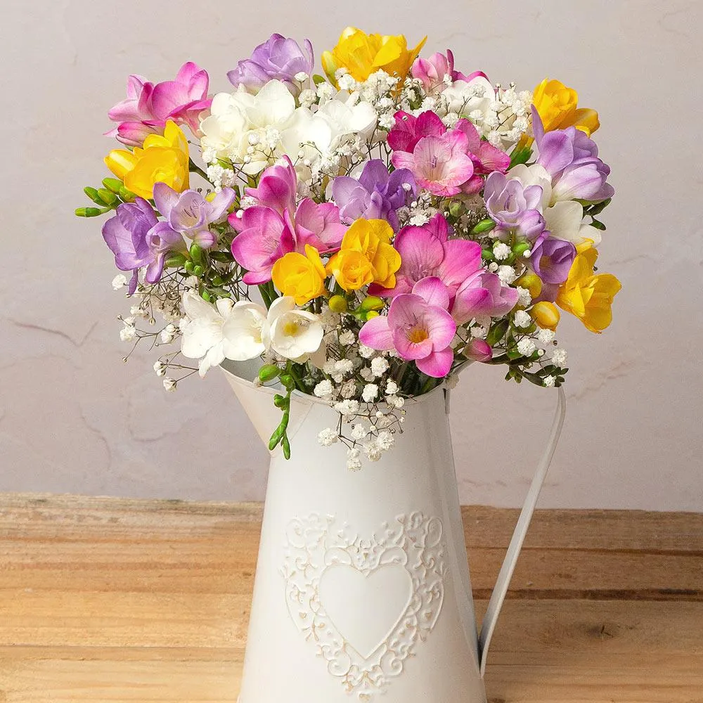 Freesias and Gypsophila