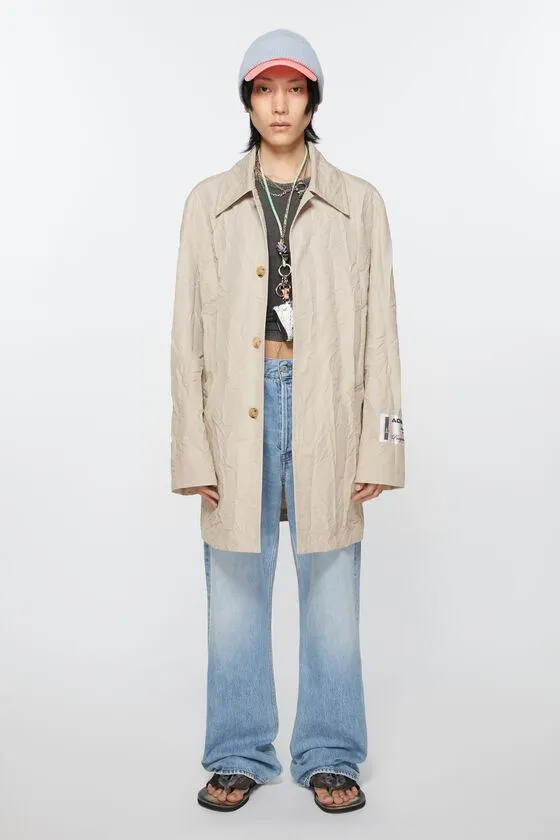 Crinkled trench coat