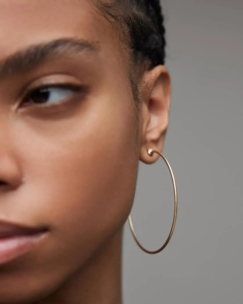 Skinny Gold Tone Hoop Earrings
