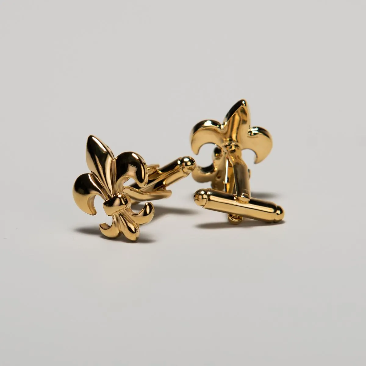 Gold colored cufflinks