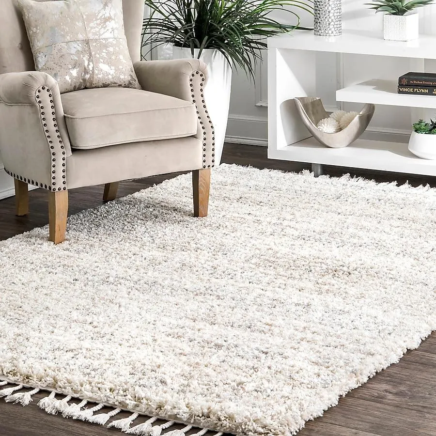 nuLOOM 8 x 11 (ft) Loomed Polypropylene Ivory Rectangular Indoor Solid Area rug
