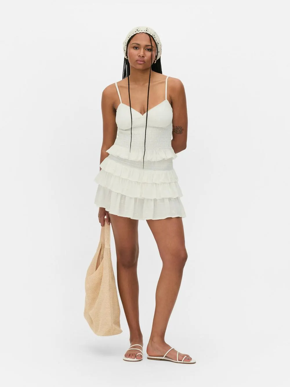 Minigonna con volant e margherite