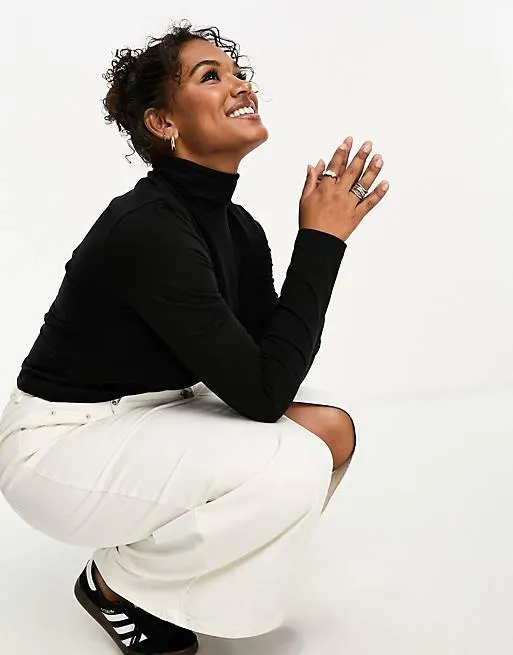 COLLUSION Plus roll neck top in black