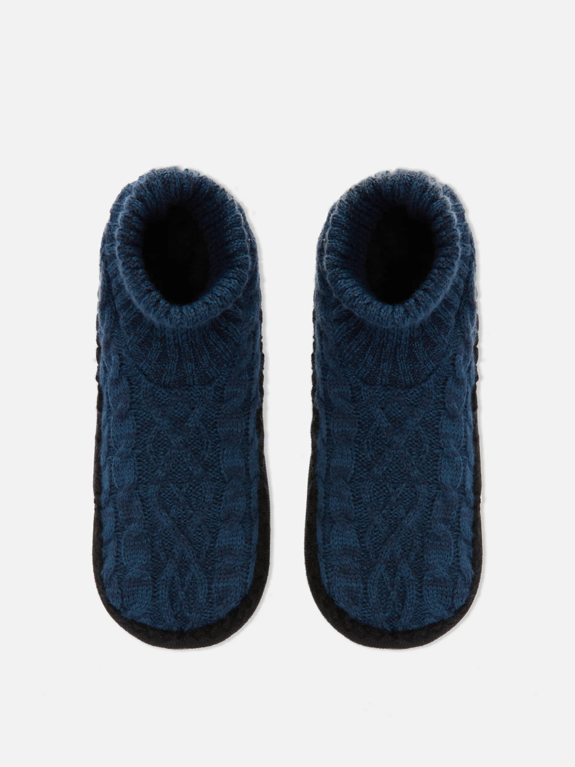 Pantufas estilo bota malha entrançada