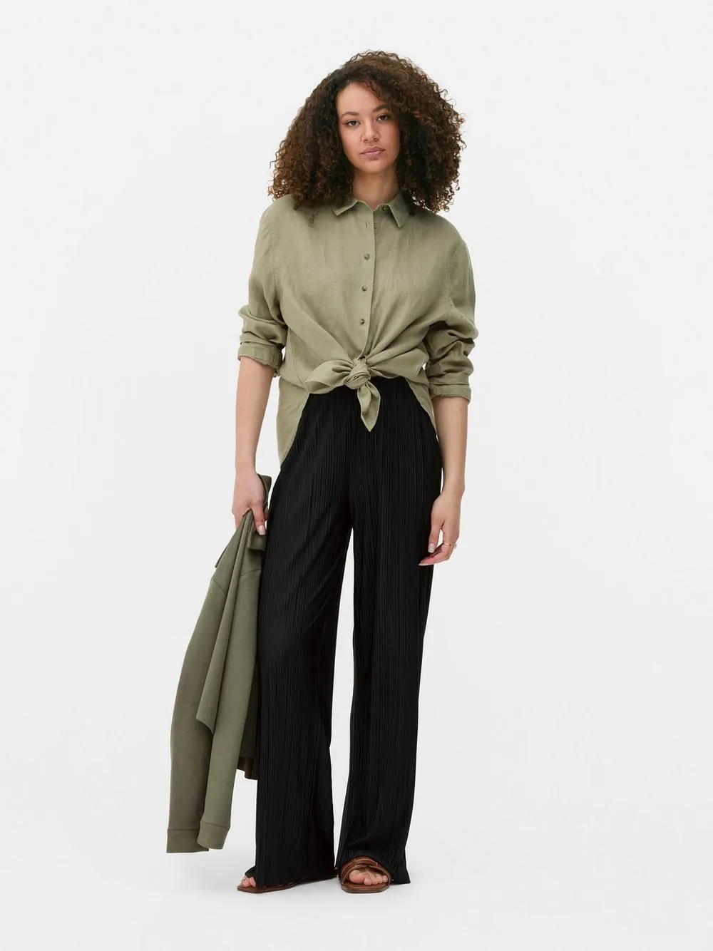 Pantalones plisados de pernera ancha