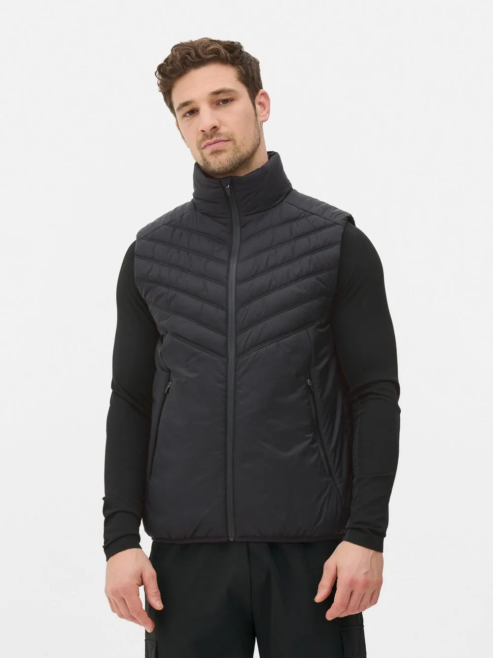 Prošívaná vesta do posilovny