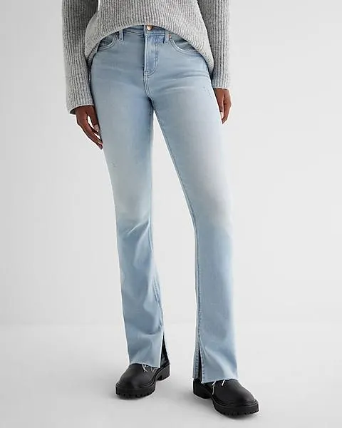 Mid Rise Light Wash Raw Hem Skyscraper Jeans