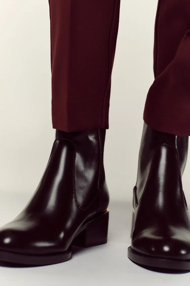 LOW HEELED ANKLE BOOTS WITH METALLIC DETAIL