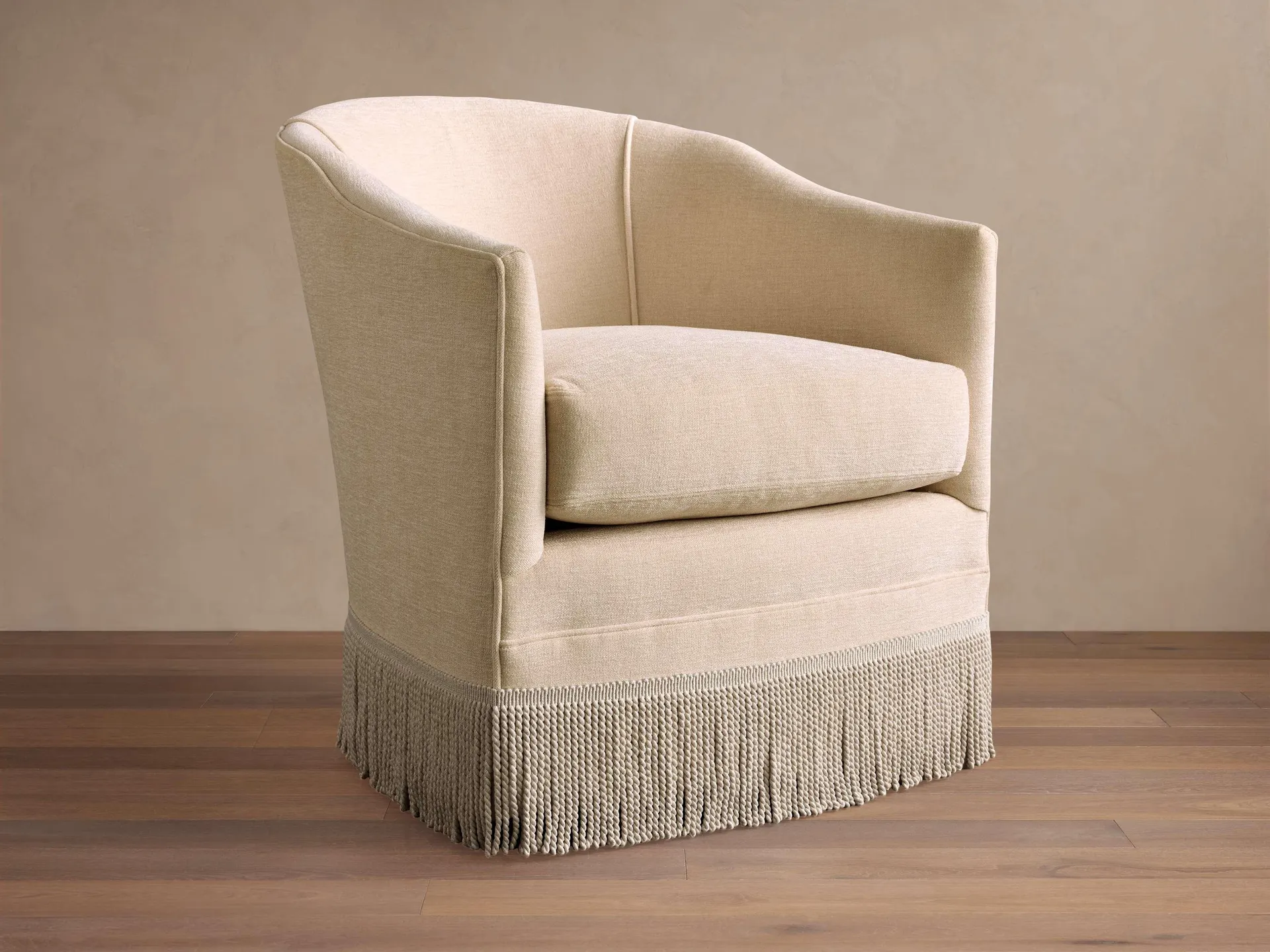 Giles Swivel Chair with Fringe