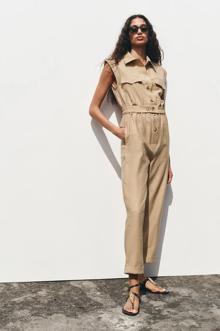 SLEEVELESS BELTED JUMPSUIT