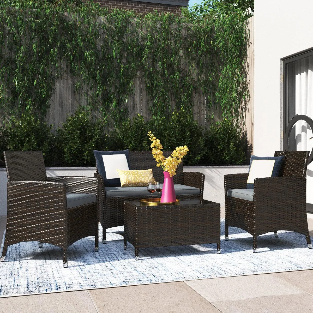 Rayna 4 Piece Rattan Sofa Seating Group with Cushions