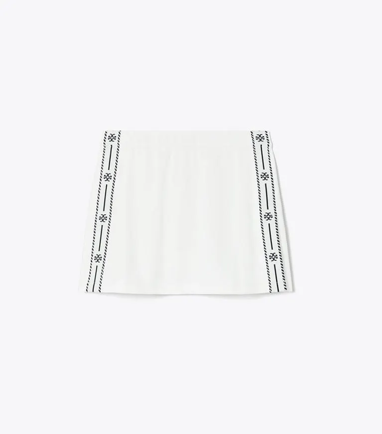 TECH PIQUÉ LOGO STRIPE TENNIS SKIRT