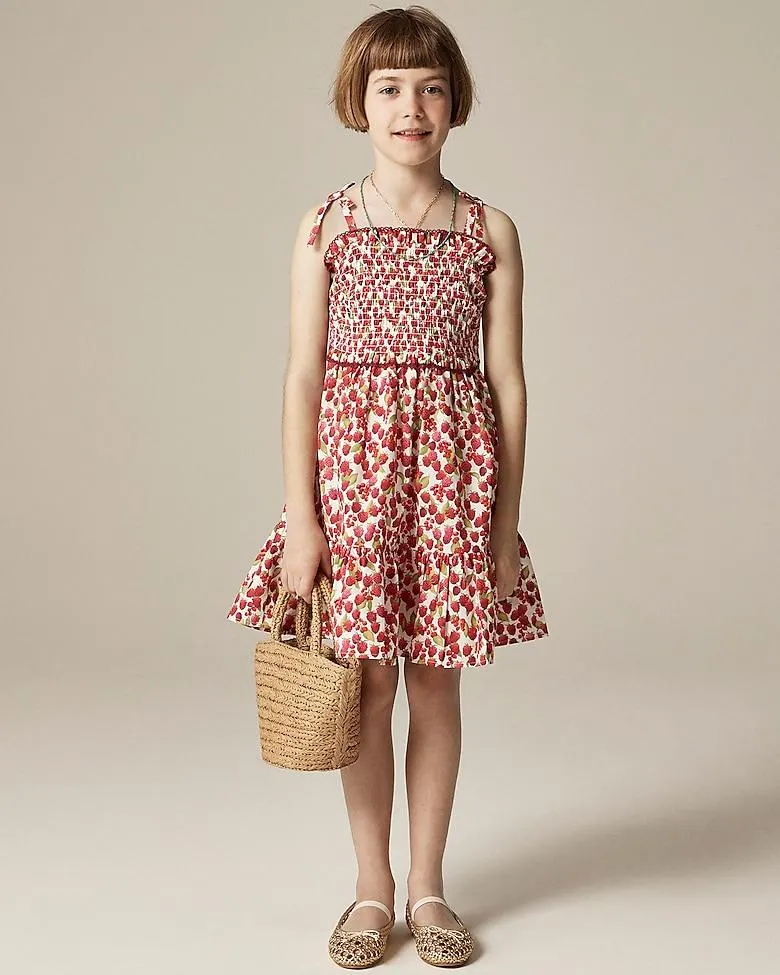 Girls' smocked dress in raspberry burst print