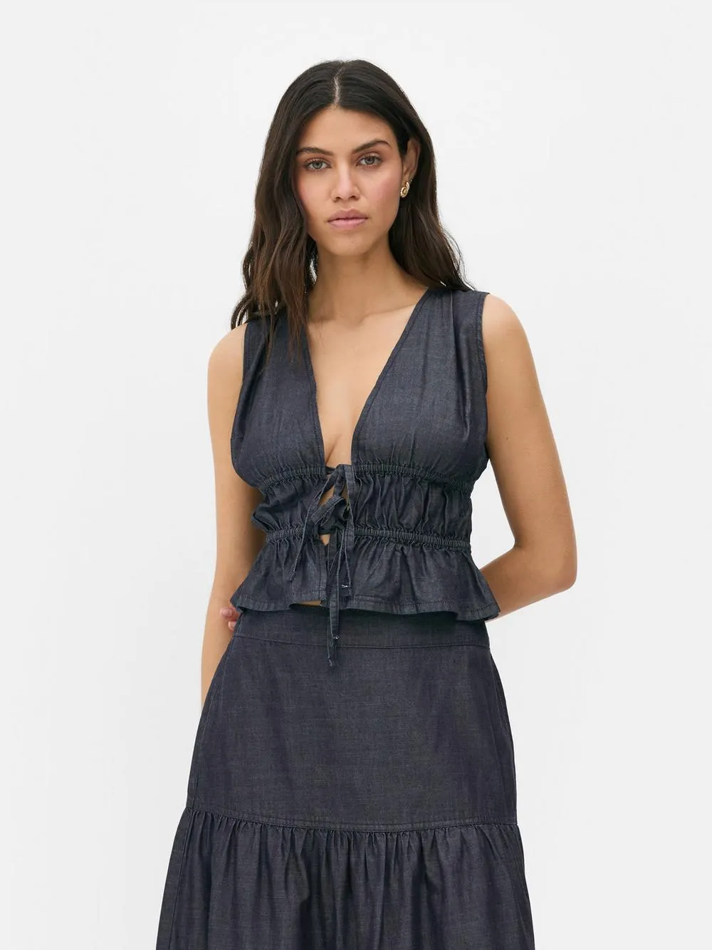 Top con nudo delantero