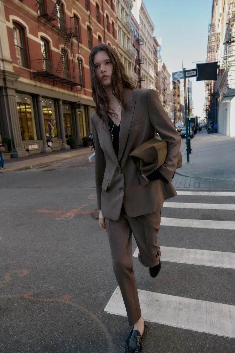 PANTS WITH BUTTONED HEM