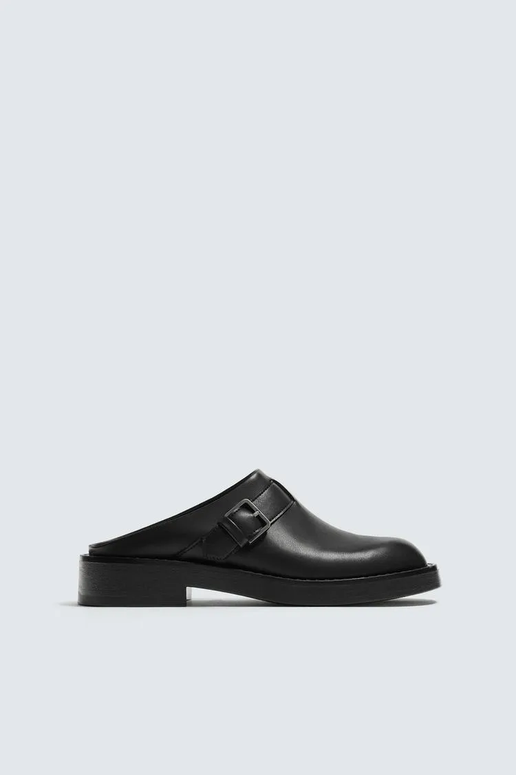 BUCKLED CLOGS