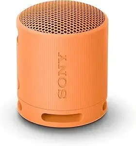 Sony SRS-XB100 Wireless Bluetooth Portable Lightweight Super-Compact Travel Speaker, Durable IP67 Waterproof & Dustproof Shower Speaker, 16 Hour Battery, Versatile Strap, & Hands-free Calling, Orange