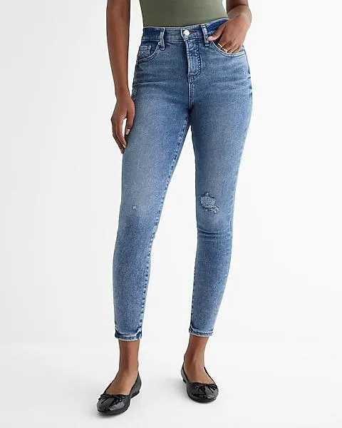 Mid Rise Medium Wash Ripped Skinny Jeans