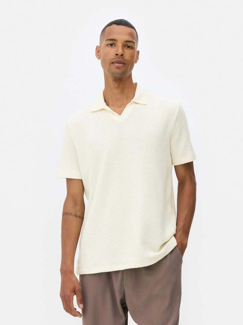 Polo de punto texturizado