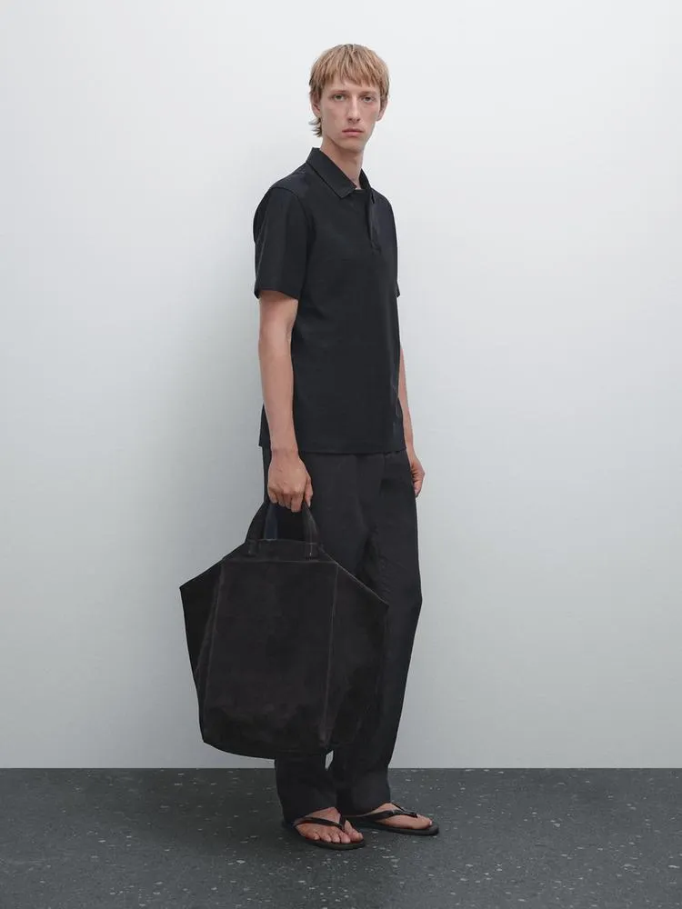 Textured polo shirt with hidden button