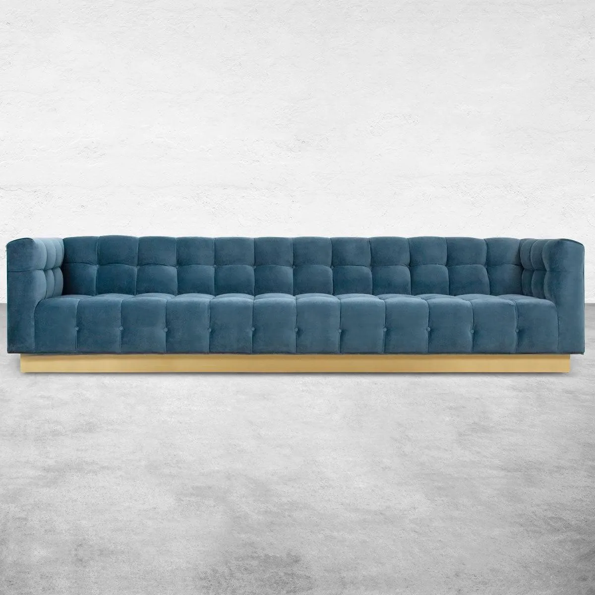 Delano Sofa in Velvet with Brushed Brass Toe Kick