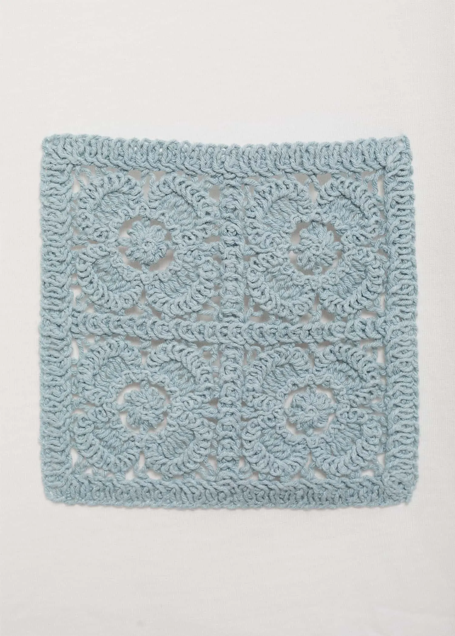 Short-sleeved t-shirt with crochet pocket